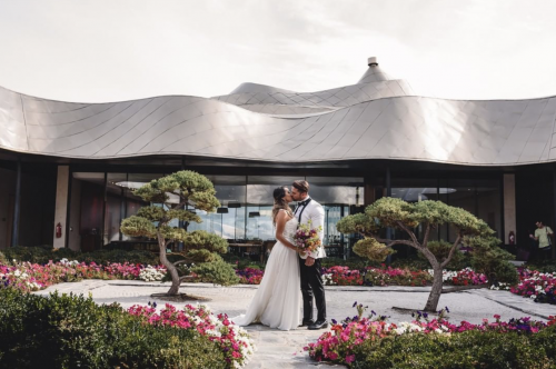 wedding flowers garden groom bride Milla Milla restaurant exterior Karesansui courtyard Zen VIK Hotel roof