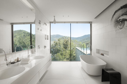Interior VIK Hotel Rooms window view lamp nature mountains Guest Suite Master Chile bathroom tub mirror Juan Pablo Jaramillo sink towels eye white swimming pool