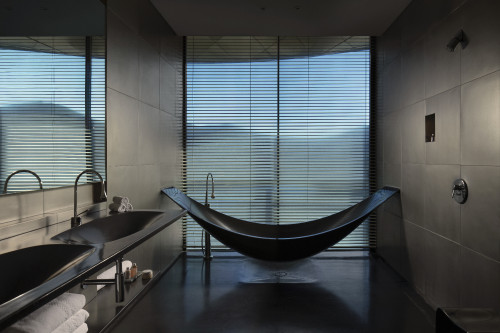 Interior VIK Hotel Rooms window lamp Master Suite Chile bathroom tub mirror Juan Pablo Jaramillo sink bathtub towel black