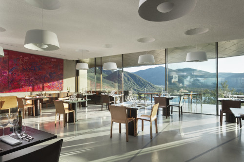 Restaurant Milla Milla Juan Pablo Jaramillo table lamps window view mountains nature landscape Chile lake reservoir