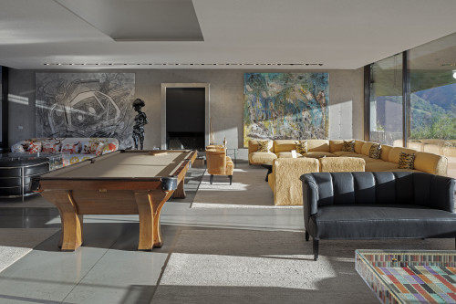 interior VIK hotel Living room sofas table window lamps painting cushion  pool billiard sculpture Juan Pablo Jaramillo Chile