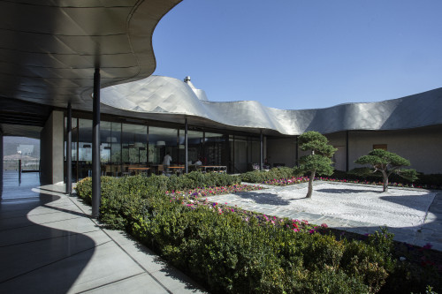 VIK Hotel Juan Pablo Jaramillo Milla Milla Restaurant Zen garden flowers exterior Karesansui courtyard roof Chile