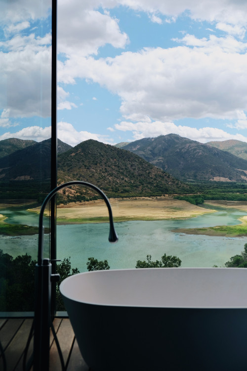 Fernando Farfan 2022 Interior VIK Hotel Rooms window view clouds landscape mountains Guest Suite Chile bathroom tub Chile