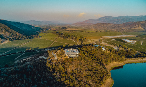 Carmen Cabezas 2022 Hotel Chile view from above landscape lake roof field mountains